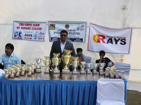 Trophies displayed on stage at the Lions Premier League cricket tournament co-sponsored by Rays