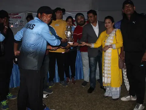 A trophy being presented to a player at the Lions Premier League cricket tournament sponsored by Rays