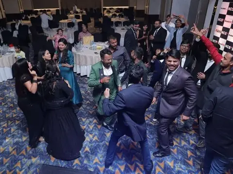 Staff and guests dancing at the TechVersary anniversary celebration
