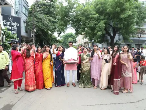 A team member being presented with a bouquet of flowers in the office