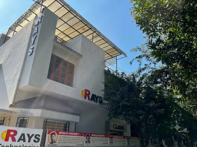 Street-level exterior view of the Rays EdTech building with its signboard
